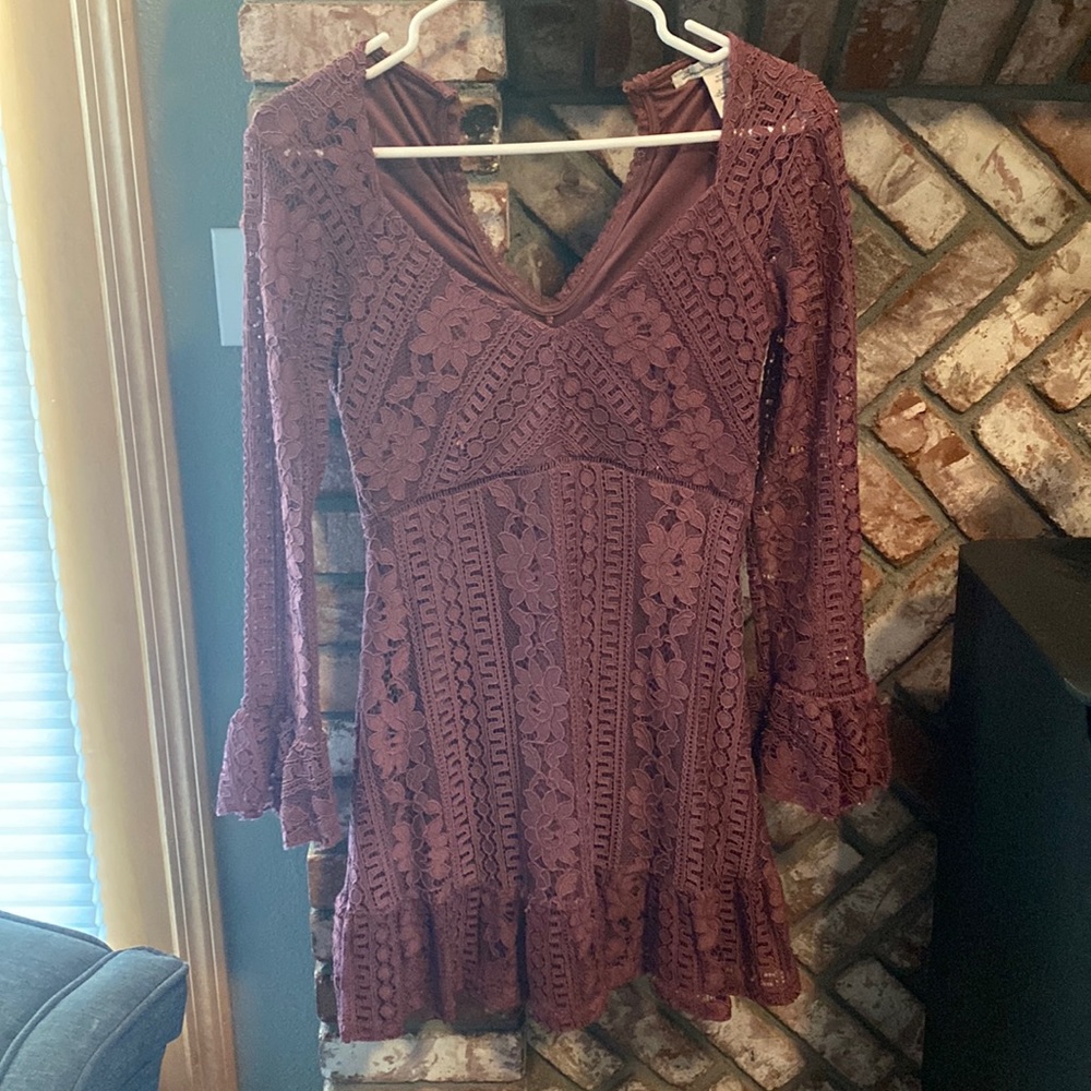 Pretty mauve colored lace dress with lining. American Rag size XS
